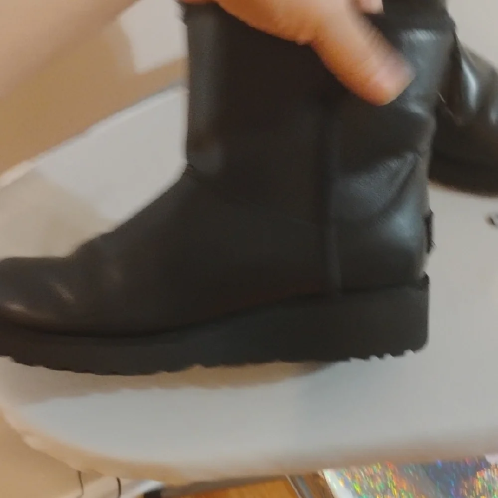 UGG Black Leather Winter Boots with Shearling Trim